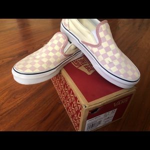 Pink and white slip on vans